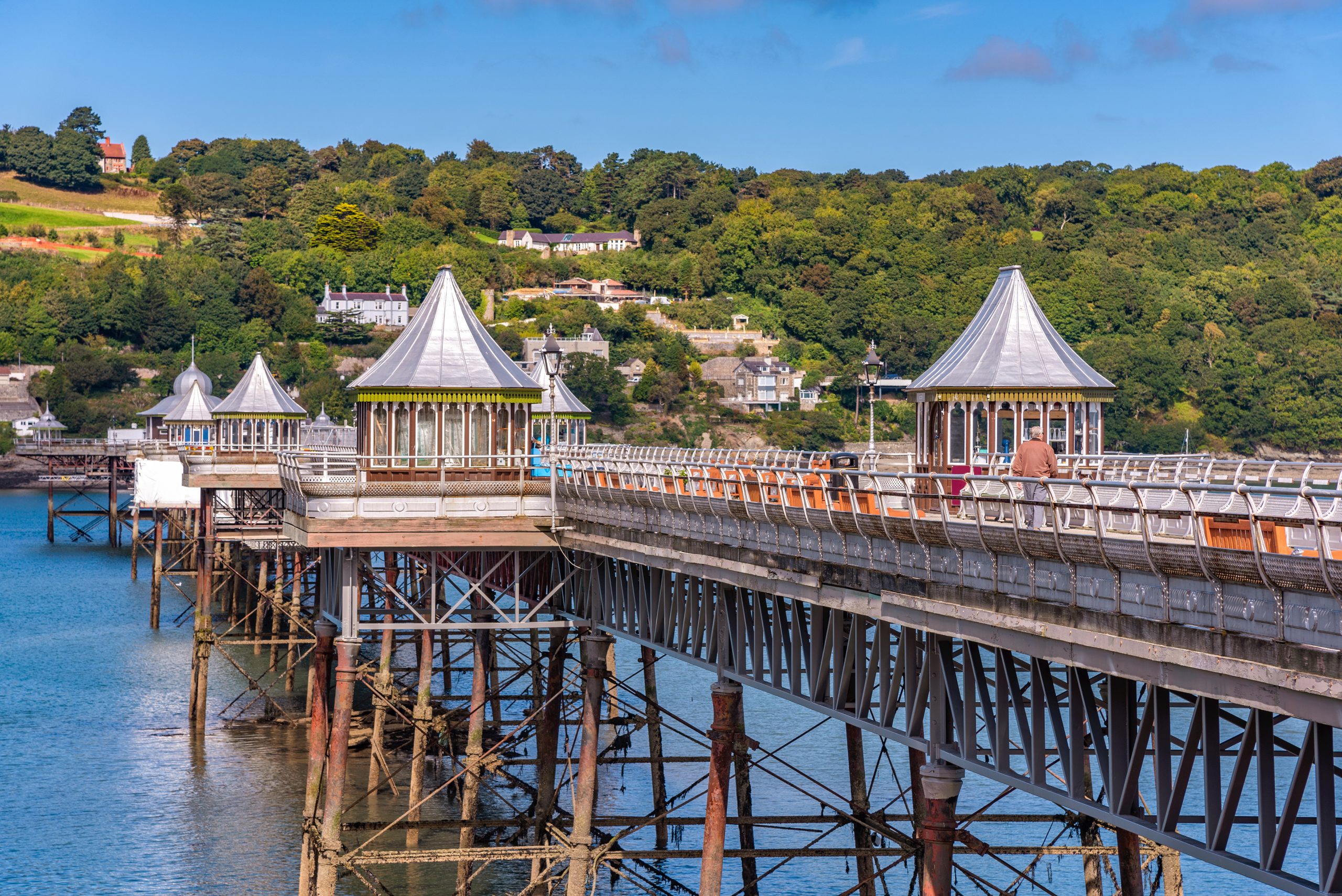 View of Garth Pier in Bangor, North Wales, stretching over the Menai Strait with Victorian-style pavilions.