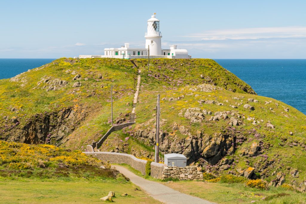 Strumble Head Lighthouse on the Pembrokeshire coast in Wales, overlooking the Irish Sea.