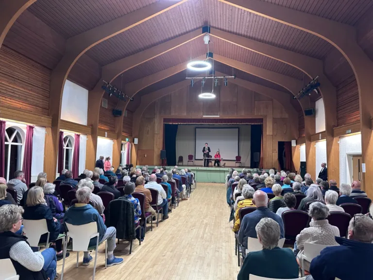 Hundreds rally in Knighton over threatened hospital cuts