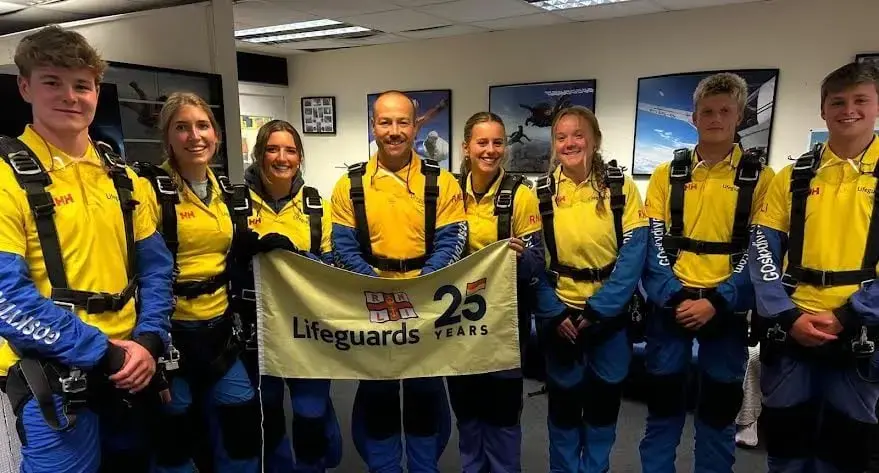South Pembrokeshire lifeguards mark 25‑year milestone with charity skydive