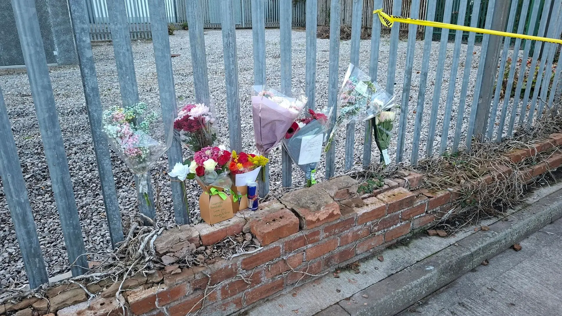 Floral tributes left at scene of fatal Prestatyn van fire