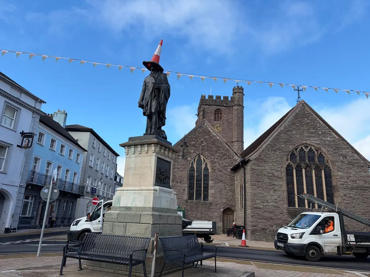 Traffic cone perched on Brecon's Duke of Wellington monument