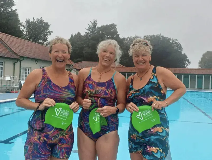 Brecon trio completes 150‑mile swim, raises £14,500 for cancer centre