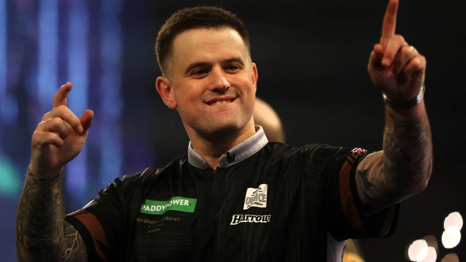 Woodhouse hits nine-darter to set up Van Veen clash